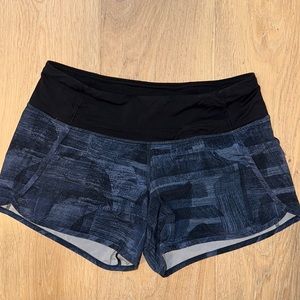 Lululemon Speed Up shorts. Size 6. 4 inch inseam. Blue and black. Gently used.